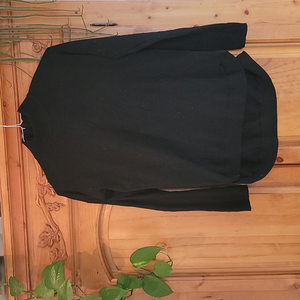 Black mock turtle neck sweater by Cyrus